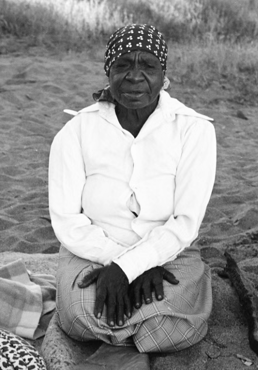 Emily Kam Kngwarray near Mparntwe Alice Springs after the first exhibition of her Utopia batiks in 1980. Photograph Toly Sawenko